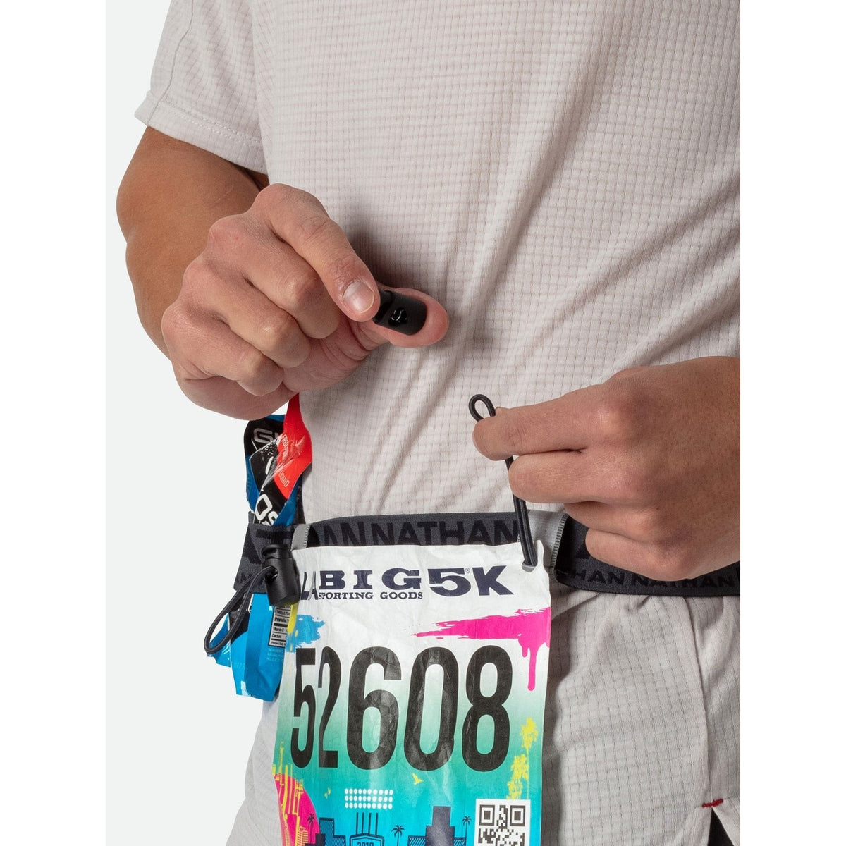Nathan | Race Number Nutrition Waistbelt | Startnummerband | trrail.com