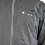Raidlight Top Extreme Ultra MP+ Herren in Schwarz – Detail des reflektierenden Mittelreißverschlusses und Logos